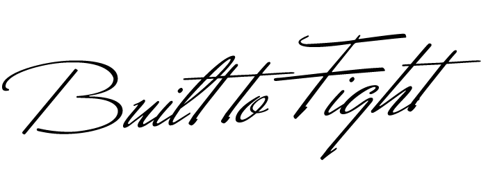 Black signature-style scribble on a white background, resembling a handwritten autograph.