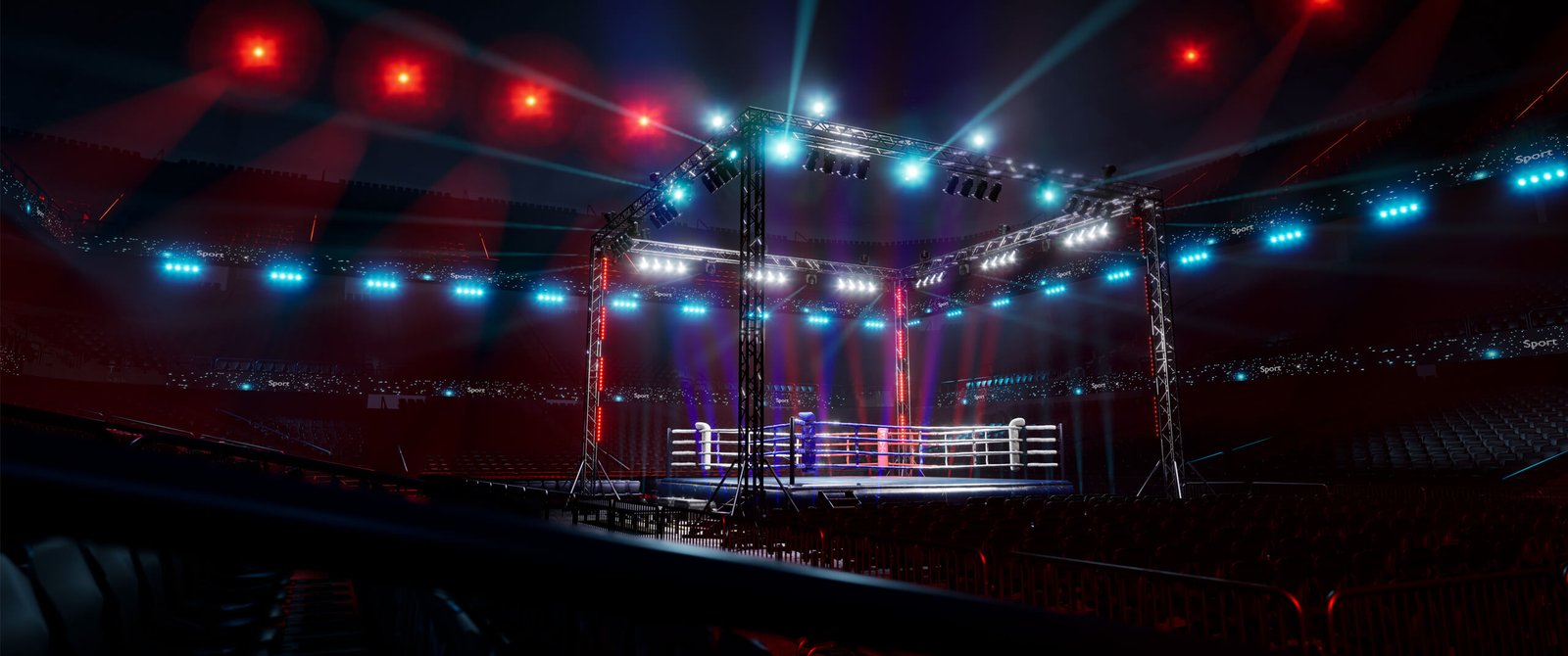 Boxing ring illuminated by colorful stage lights in a dark arena.