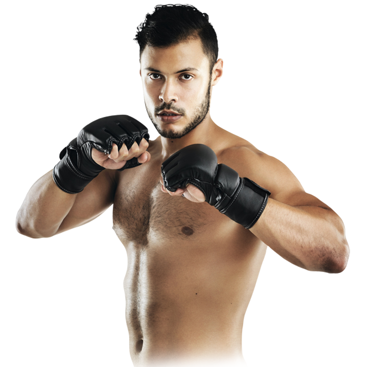 Male athlete in black boxing gloves, shirtless, fists up in a fighting stance toward the camera.